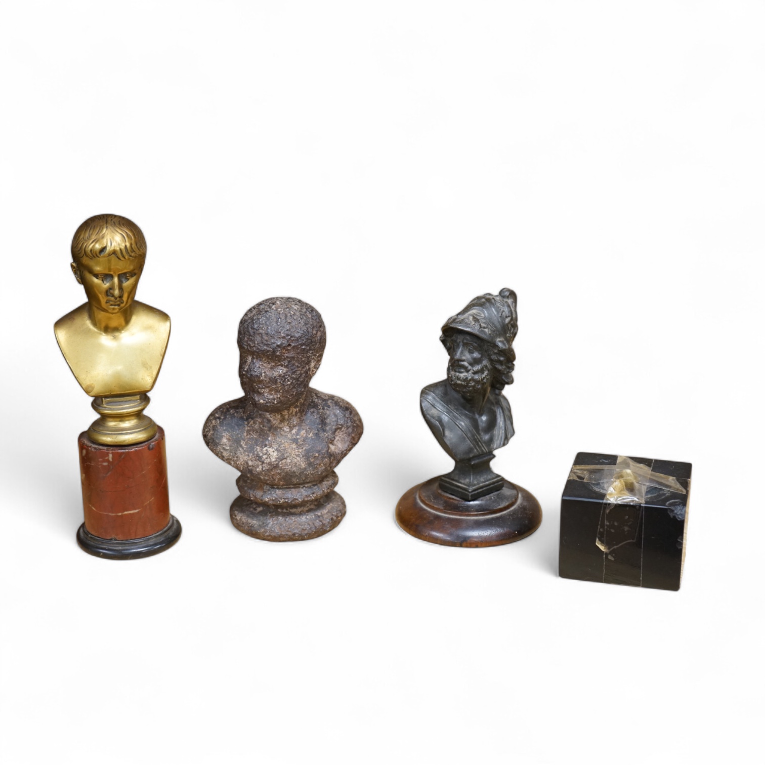 A bronze bust of Napoleon, a bust of Ajax and a cast iron bust of an Emperor, tallest 18cm